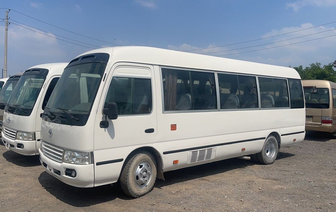 7m 30 sièges Toyo Ta Coaster Moteur de bus Capacité 4L Dimensions globales mm 7725x2000x2600
