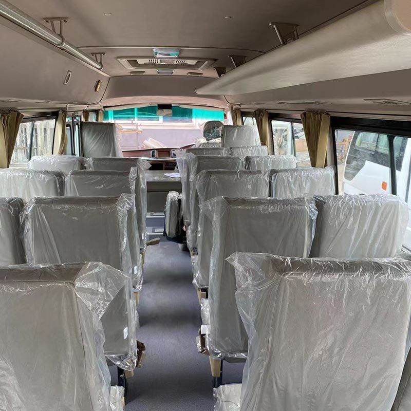 Vitesse maximale 100 km/h Toyota Coaster Bus 20-23 sièges avec moteur à essence d'occasion