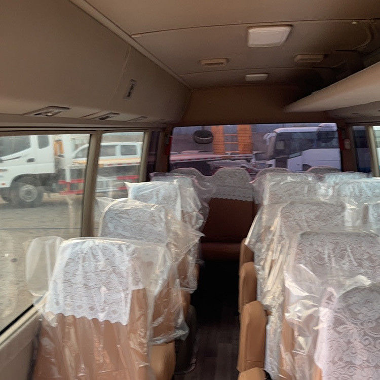 30 sièges Toyota Coaster Bus utilisé avec une puissance maximale de 113/5200kw et une capacité de 30 sièges
