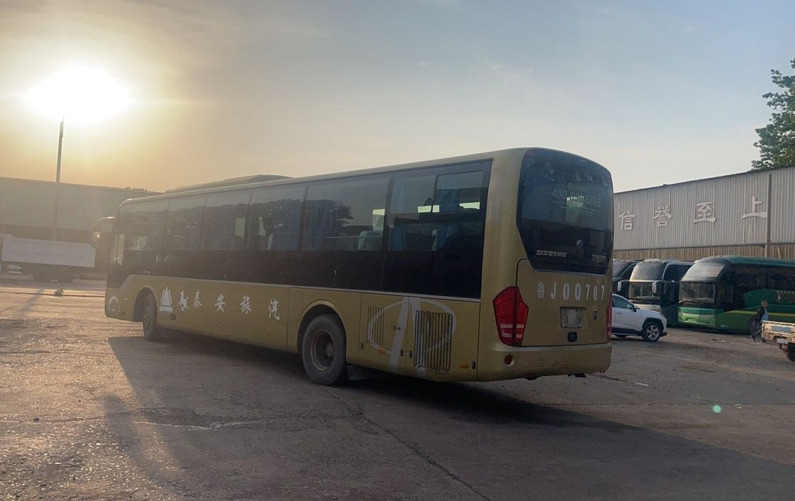 Parfaitement rénové 65 passagers 65 sièges autocar avec moteur et base longue roue