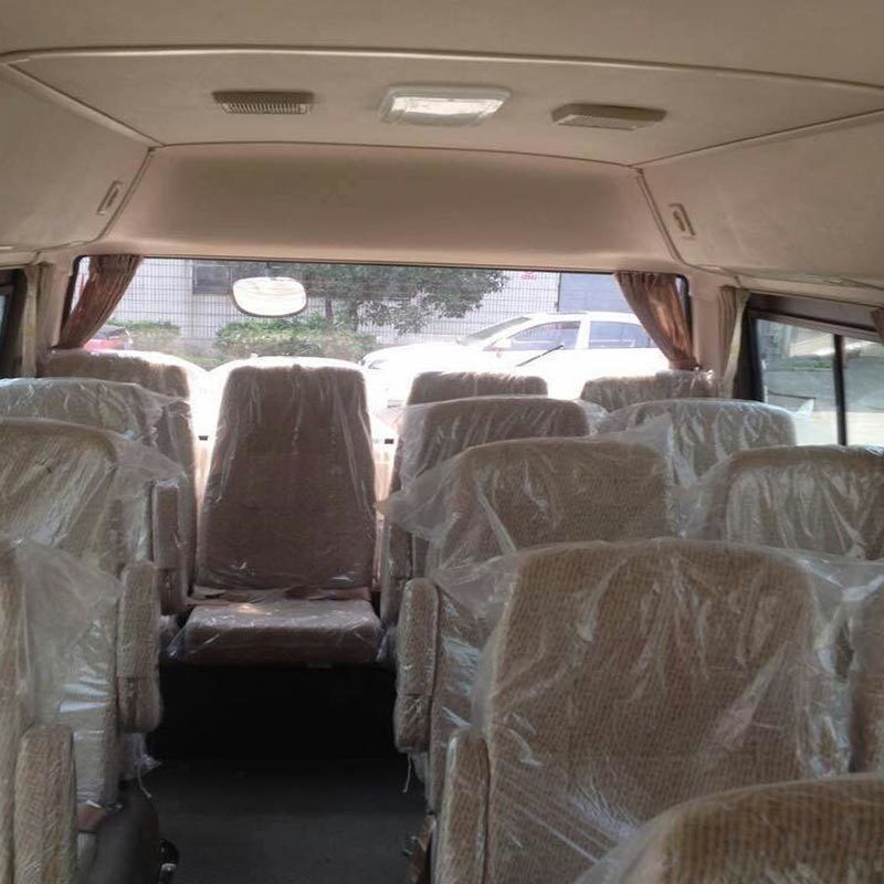 Modèle 19 sièges RHD Mini Coaster Bus de passagers 70L réservoir d'huile 7.00R16 pneus prêts à expédier