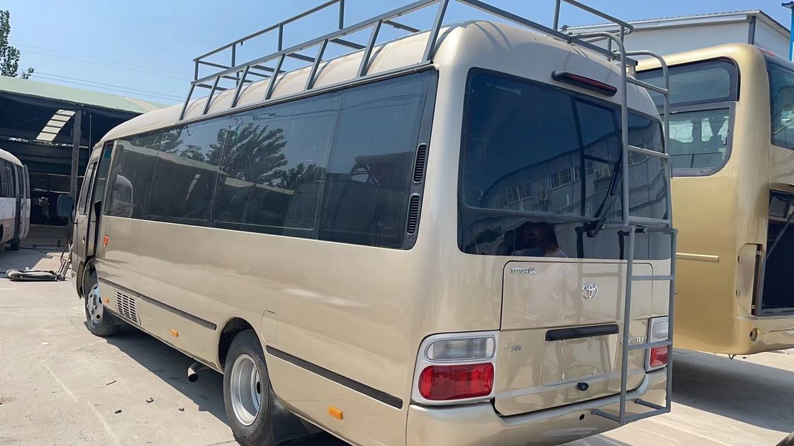 30 sièges Japon Autobus d'occasion Manuel Toyota Coaster Autobus avec 7005*2040*2785mm Dimensions