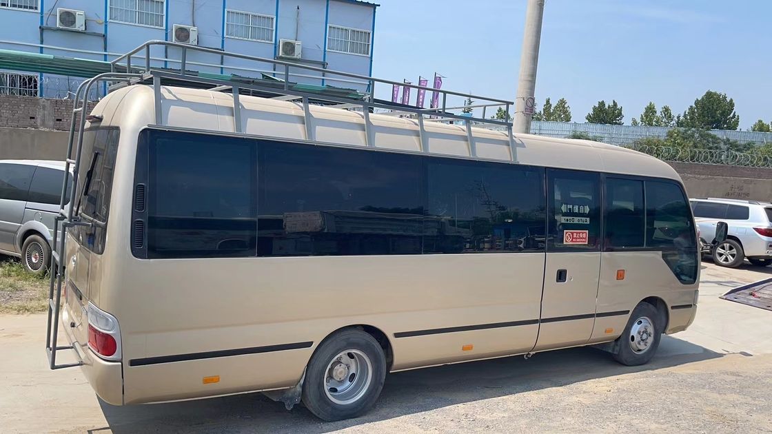30 sièges Japon Autobus d'occasion Manuel Toyota Coaster Autobus avec 7005*2040*2785mm Dimensions