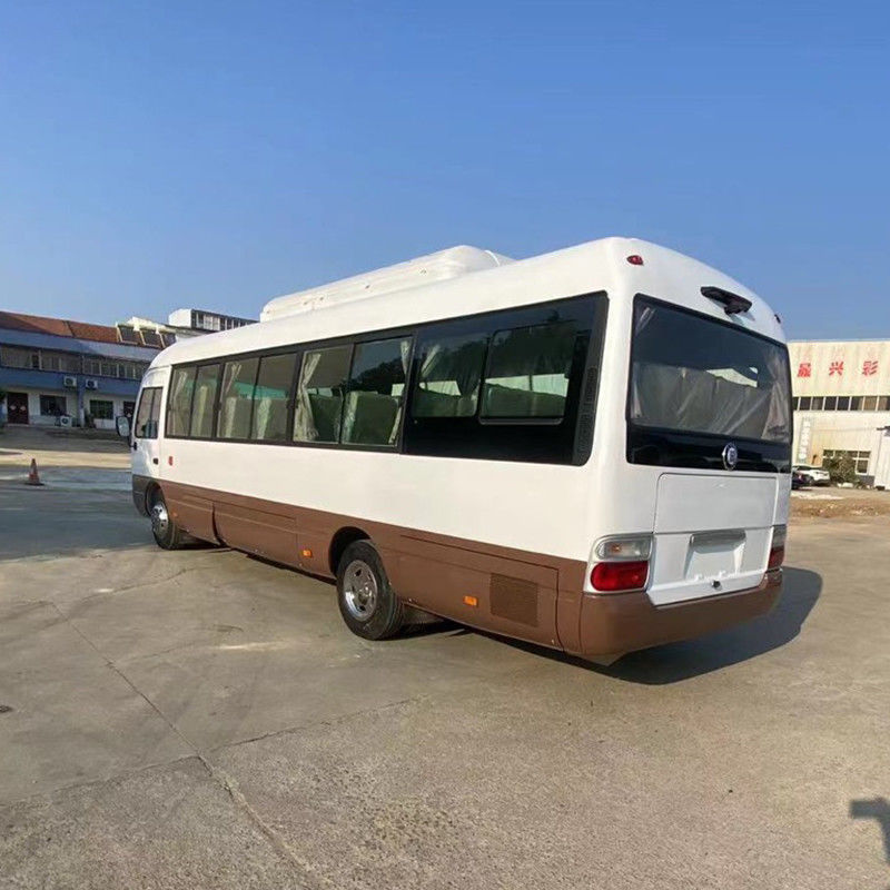 LHD RHD 30 sièges Toyo ta Coaster Bus avec réservoir de carburant de 70L et cylindrée de 4500-6700ml