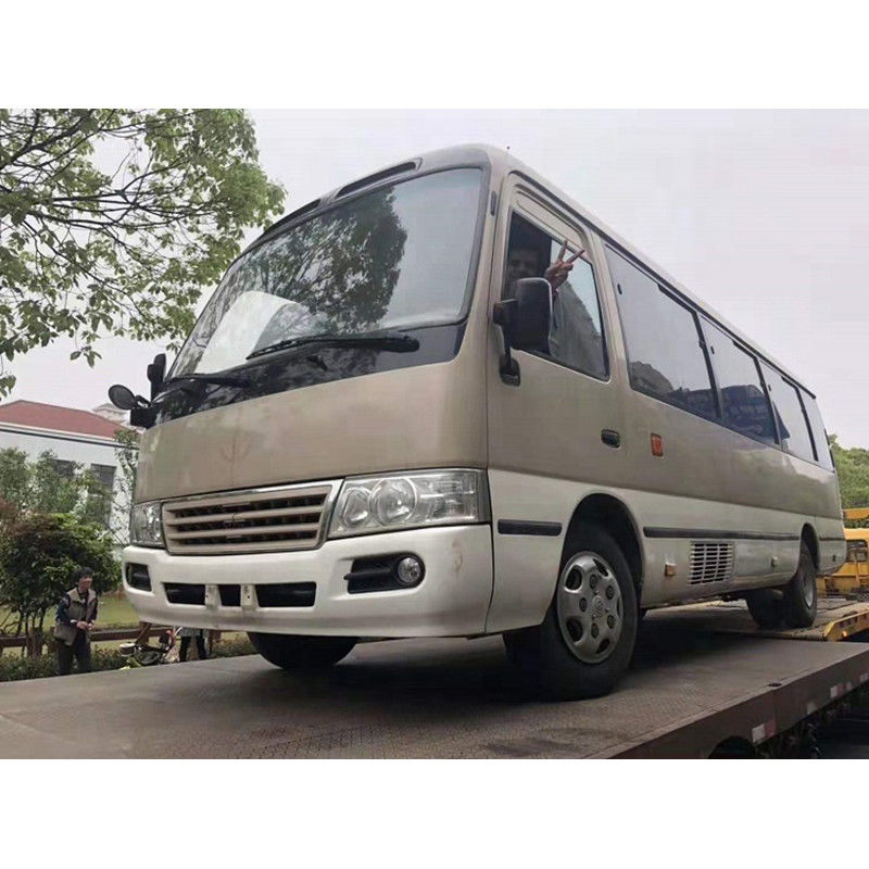 30 places TOYO TA Coaster Bus Type de carburant diesel et pneus 6,50-16 pour le transport de passagers