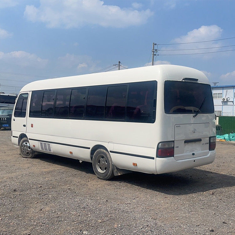 Autobus Toyota Coaster utilisé à gauche pour vos besoins de transport 26-30 places