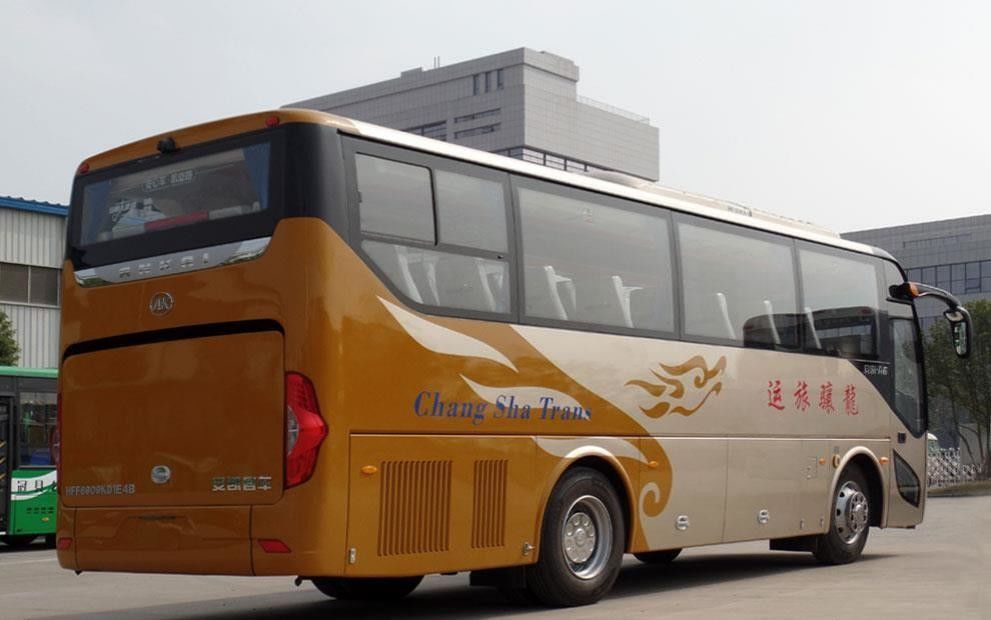 Bus de 10m à gauche avec design couleur et intérieur luxueux